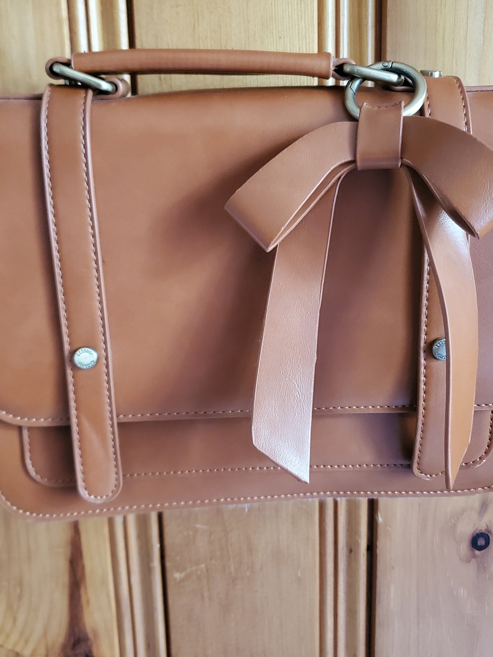 Classic Tan Satchel Handbag with Bow Accent